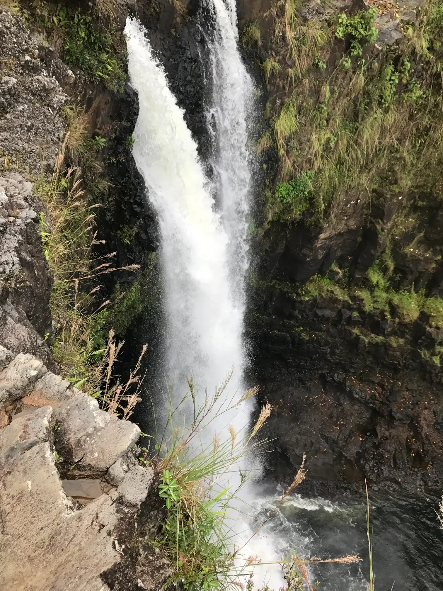 Rainbow Falls waterfall cascading over an ancient lava cave
