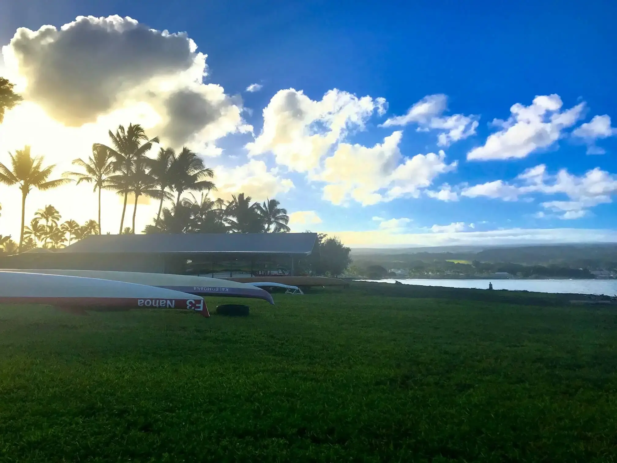 Traditional Hawaiian outrigger canoes on Hilo Bay